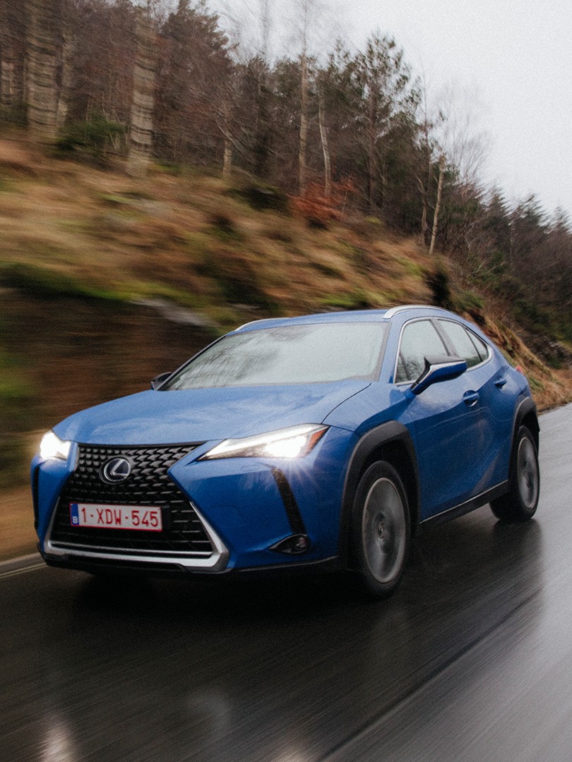Lexus UX 300e driving on a road