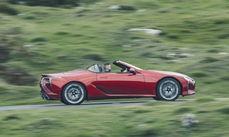 person driving a Lexus LC 500 Convertible