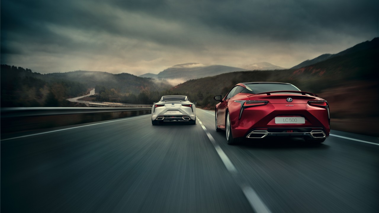 two Lexus LC 500 cars driving