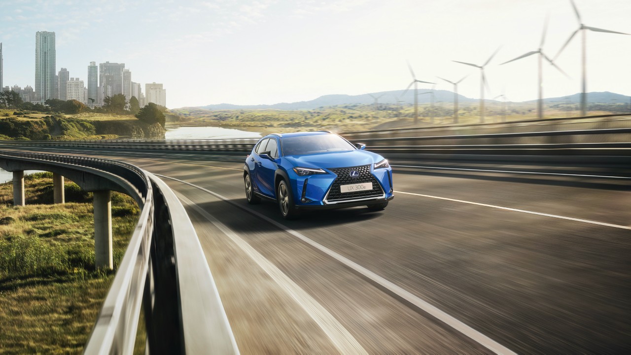 Lexus UX300 e driving along road