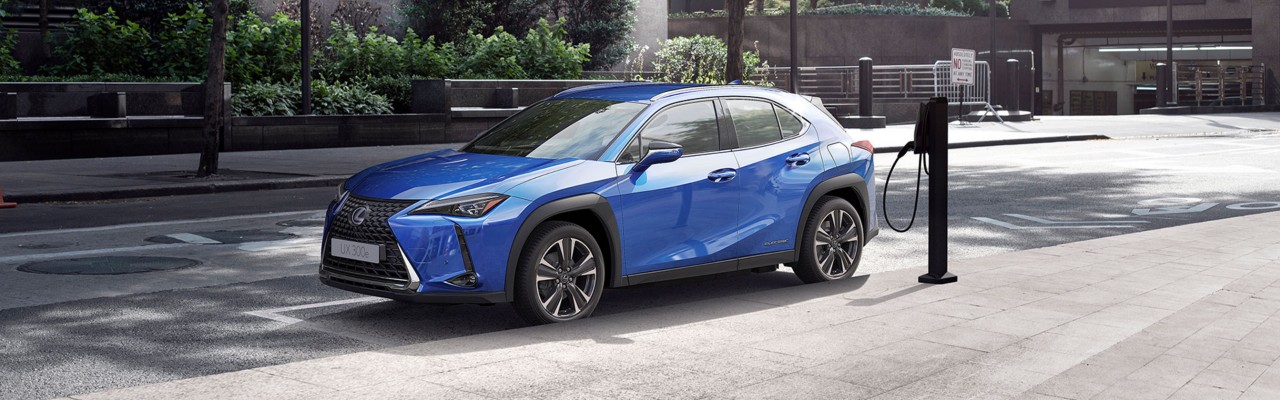Lexus UX 300e charging in the street