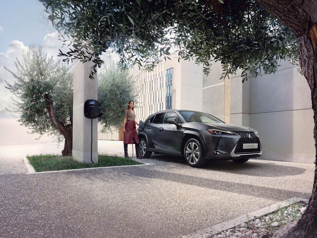 Lexus UX 300e charging in the street