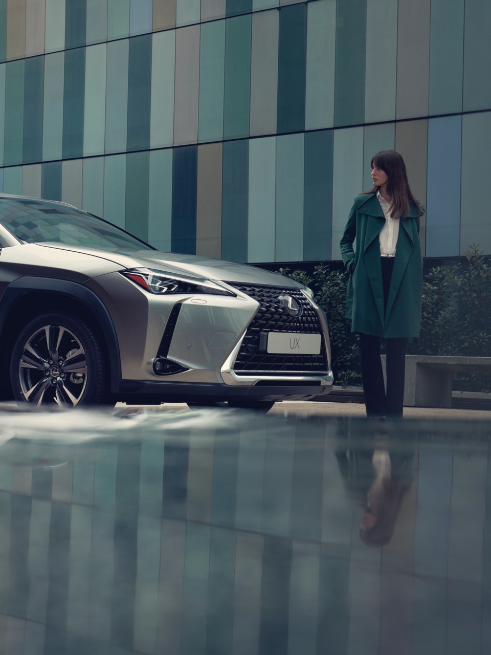 woman standing next to a car