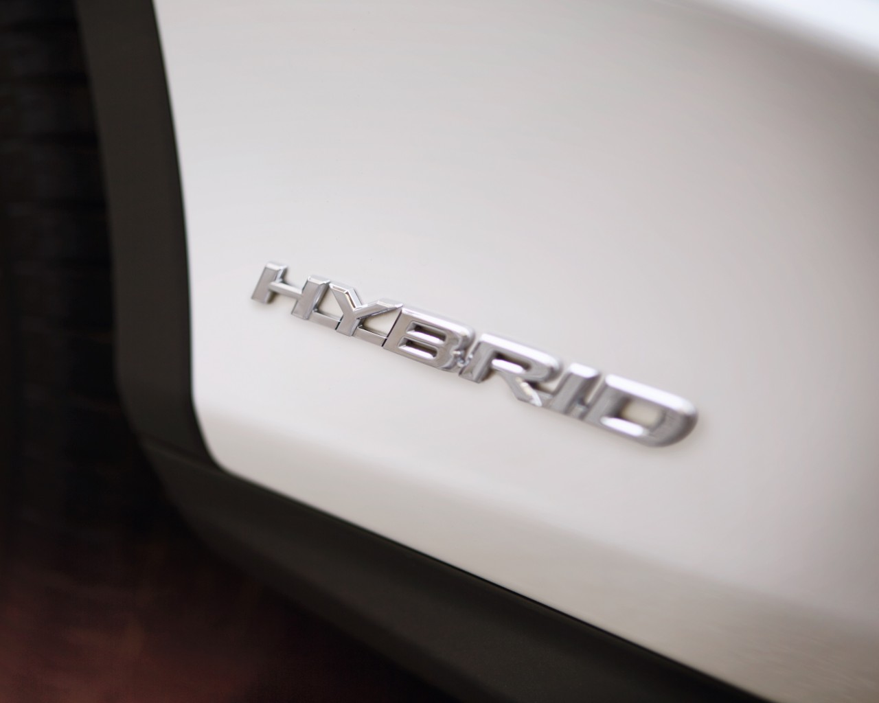 Lexus Hybrid logo on car