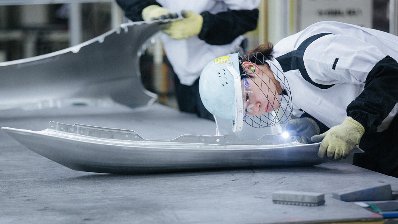 person working in a Lexus factory