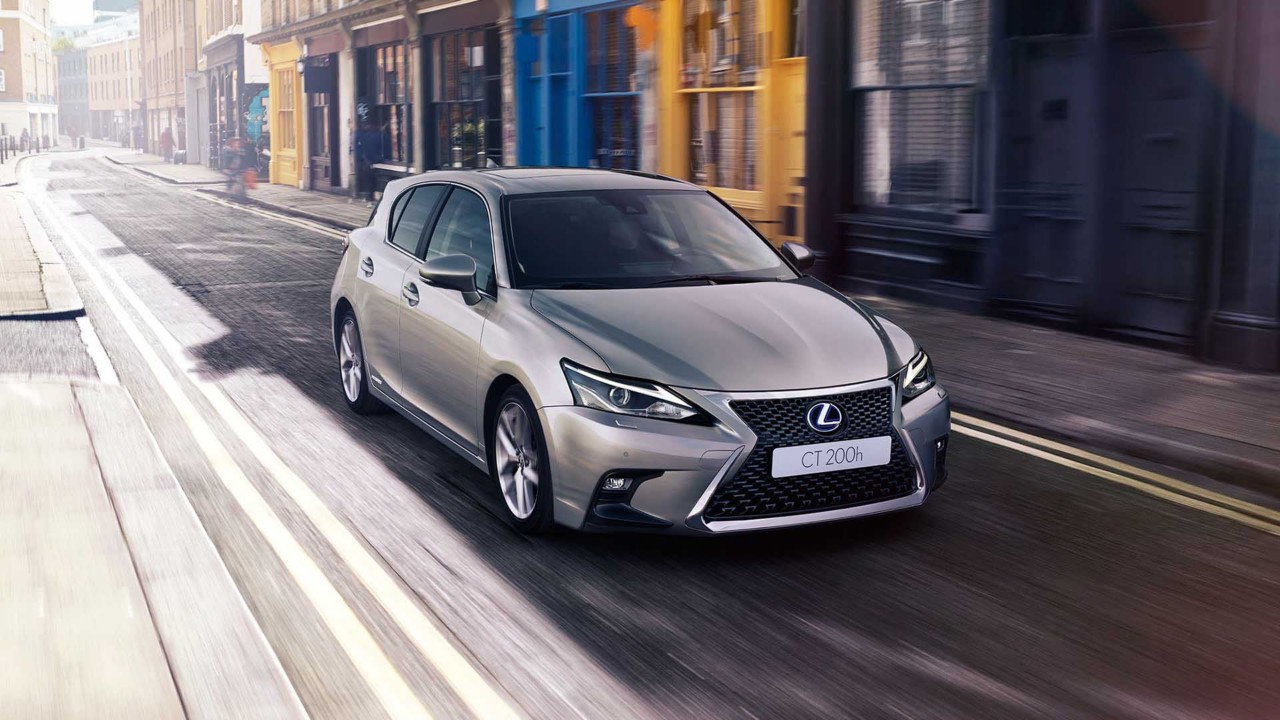 Lexus CT 200h driving down a road