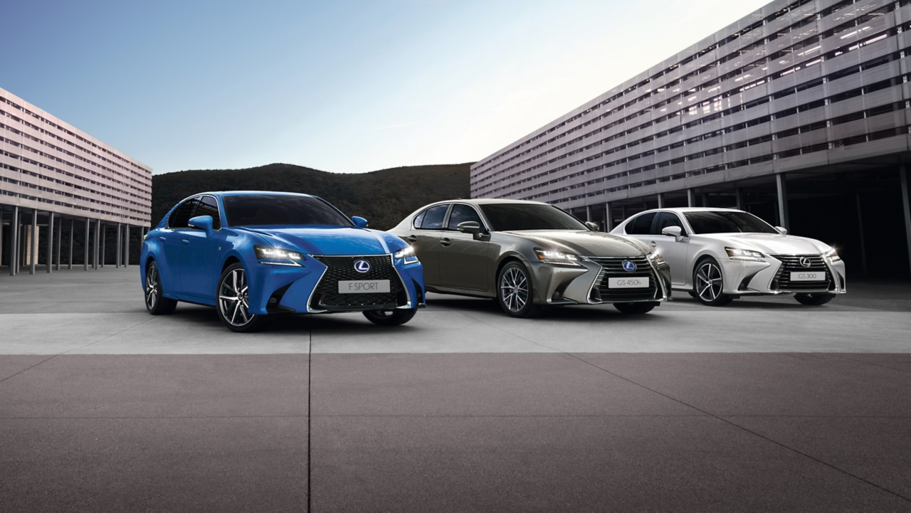 a collection of Lexus GS cars parked outside