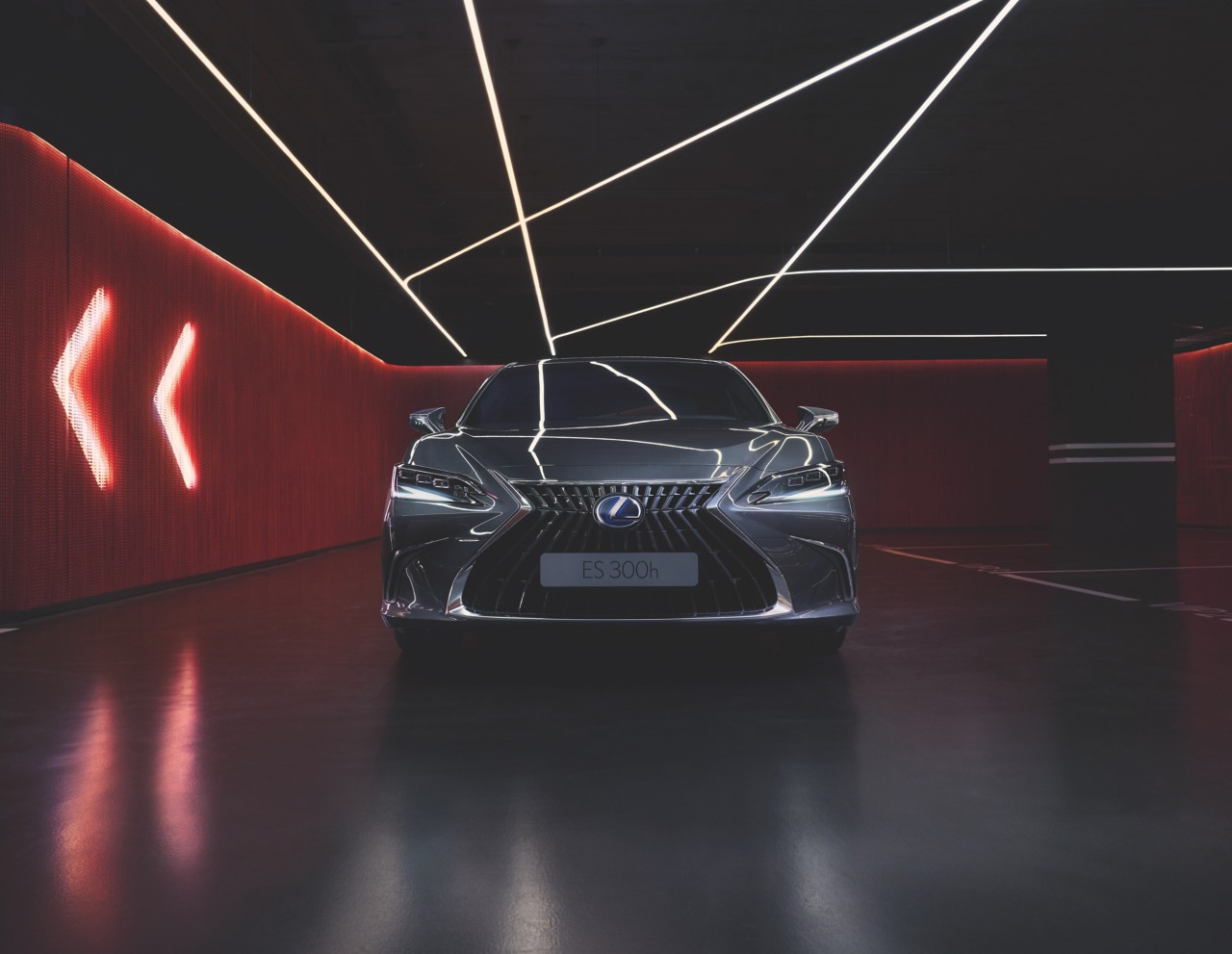 Lexus ES parked in a red warehouse