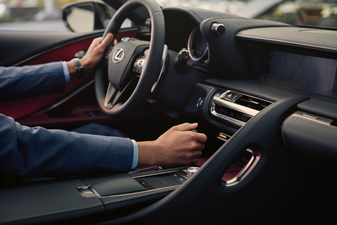 A woman driving an LC CV