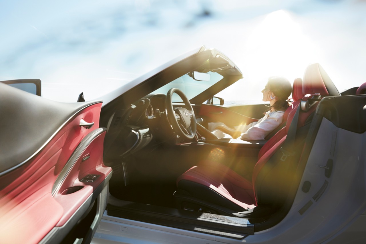 A woman driving an LC CV
