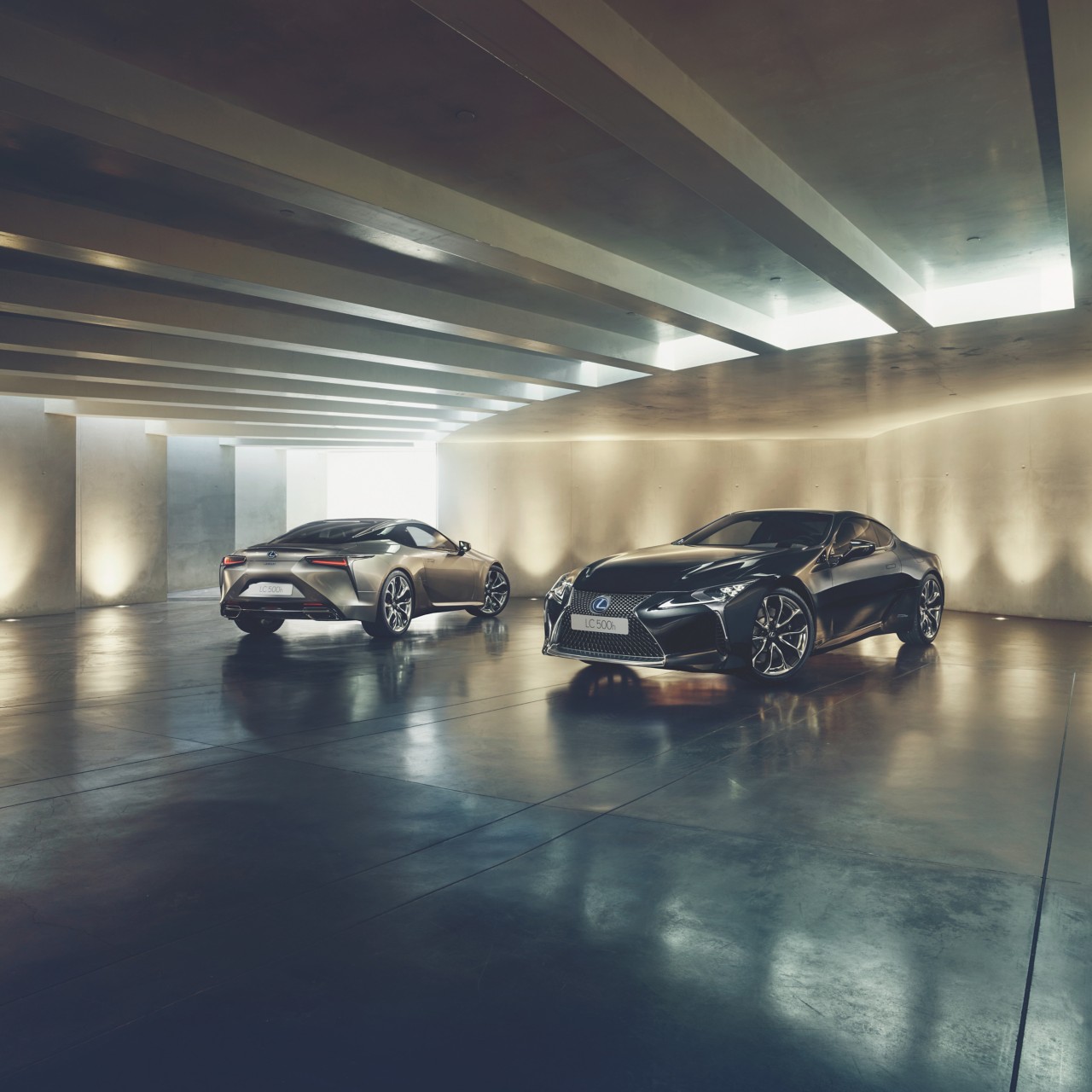 Lexus LC cars parked inside a building