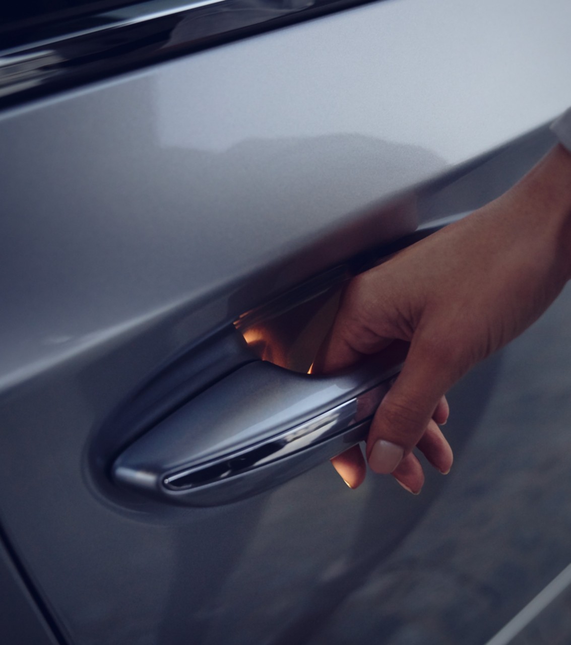 person opening Lexus car door