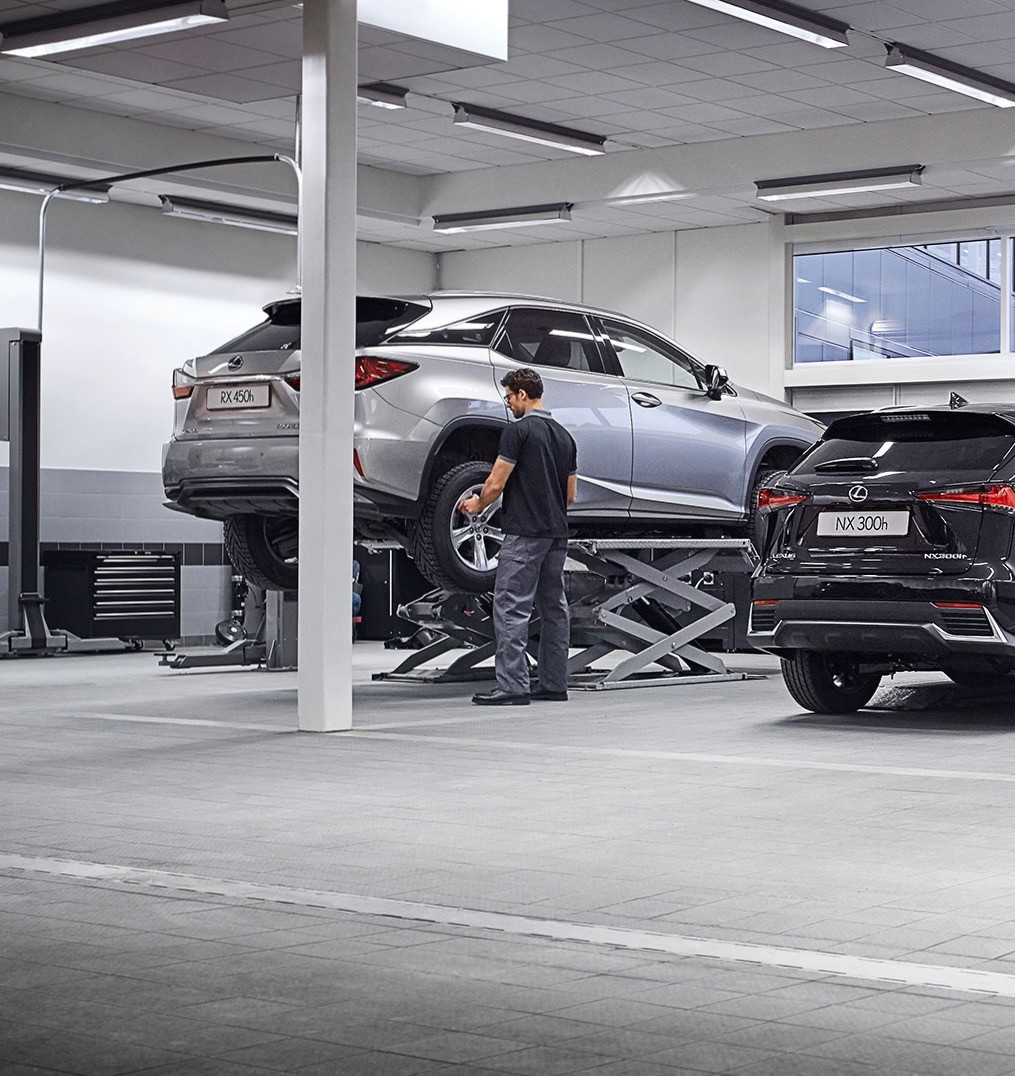 man working in a Lexus garage