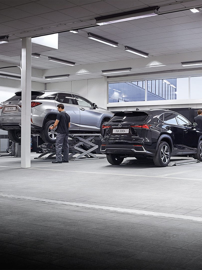 man working in a Lexus garage