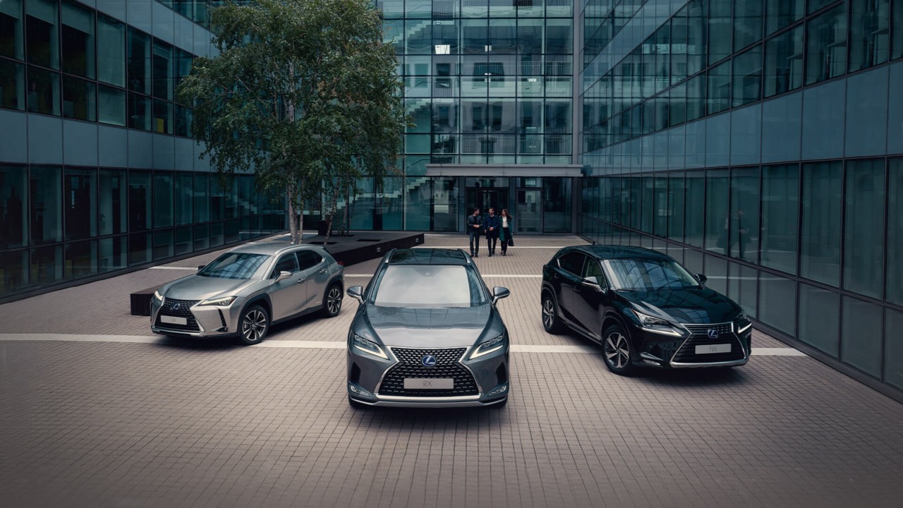 a collection of Lexus cars parked outside