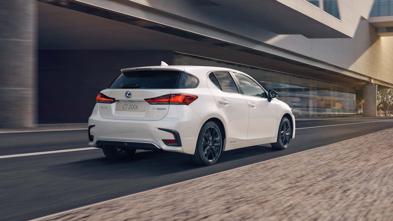 Lexus CT 200h driving down a road