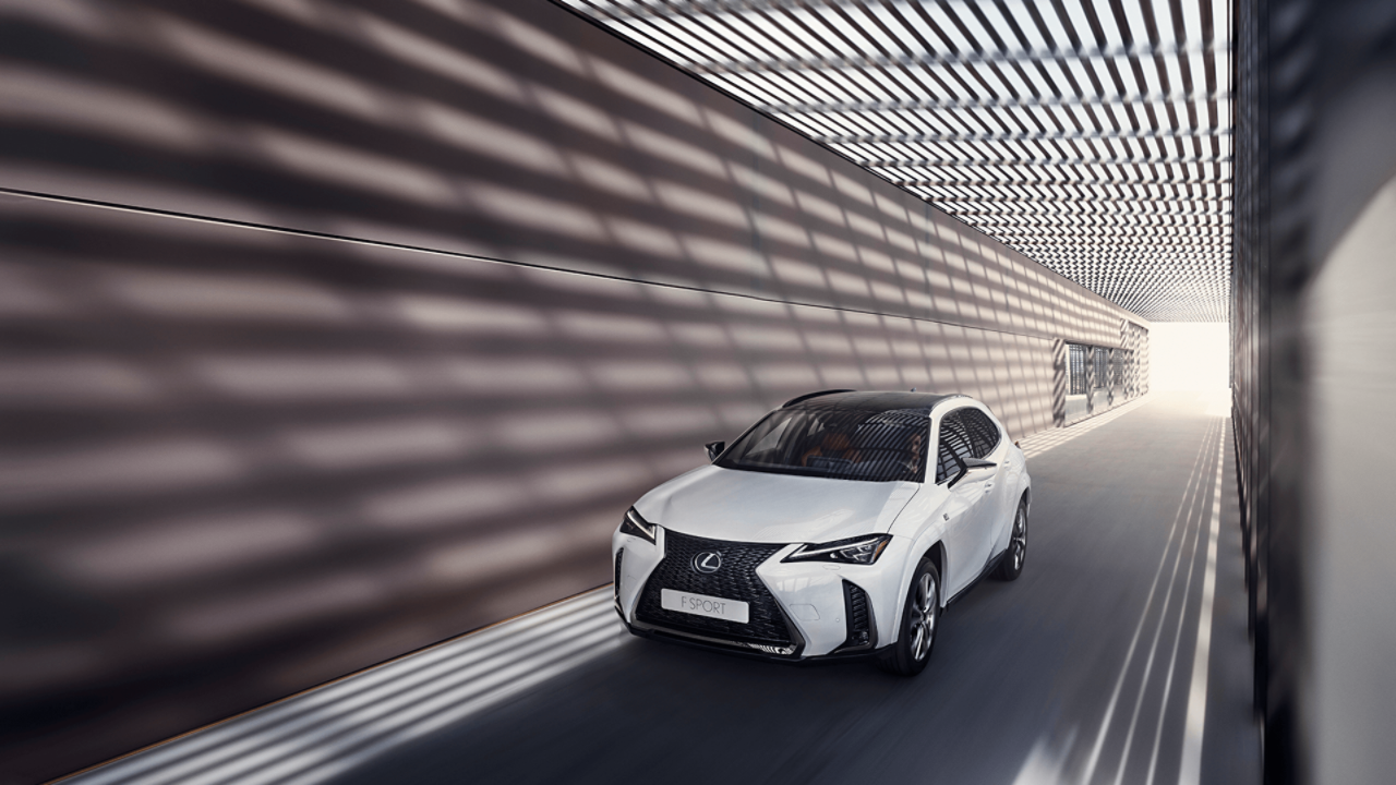  A Lexus UX driving through a tunnel